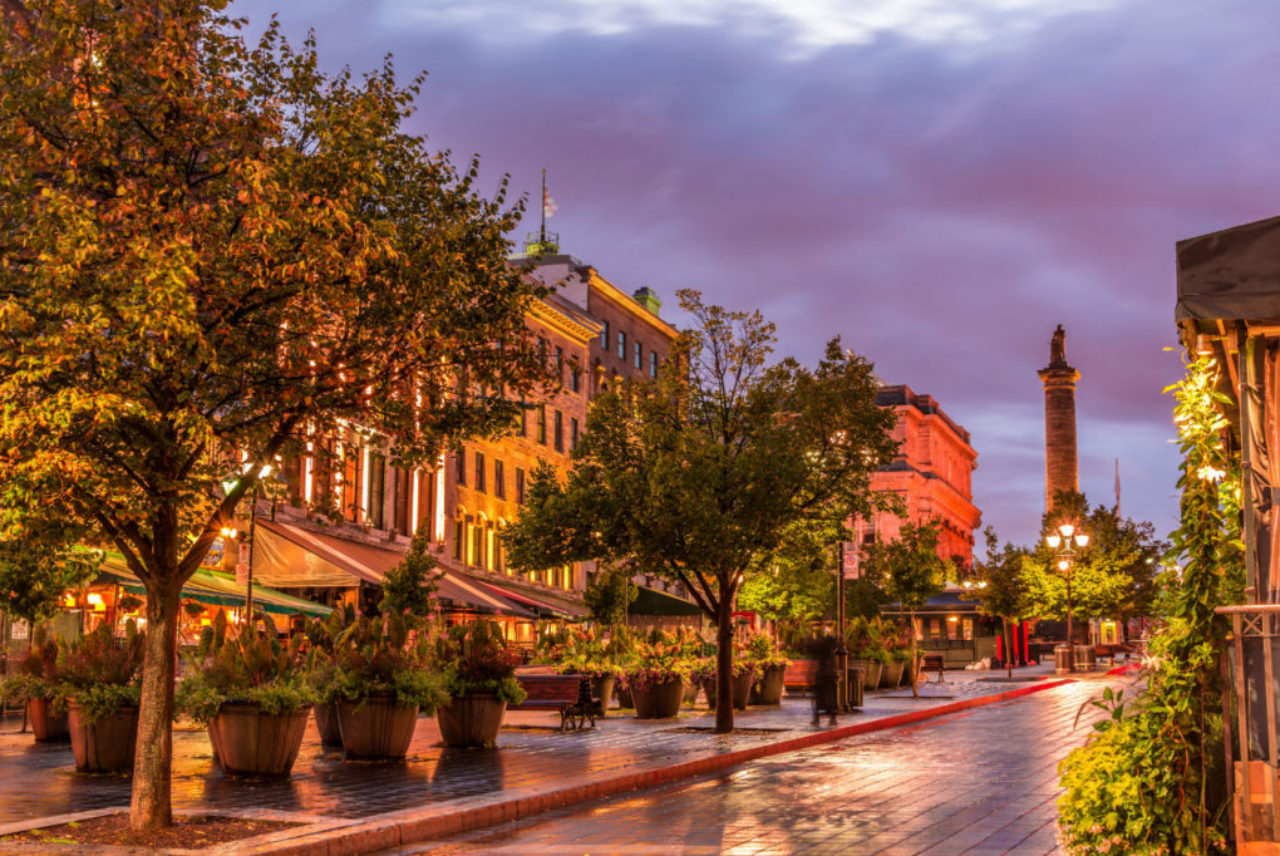 old-montreal-square-lined-with-tress-and-flowers