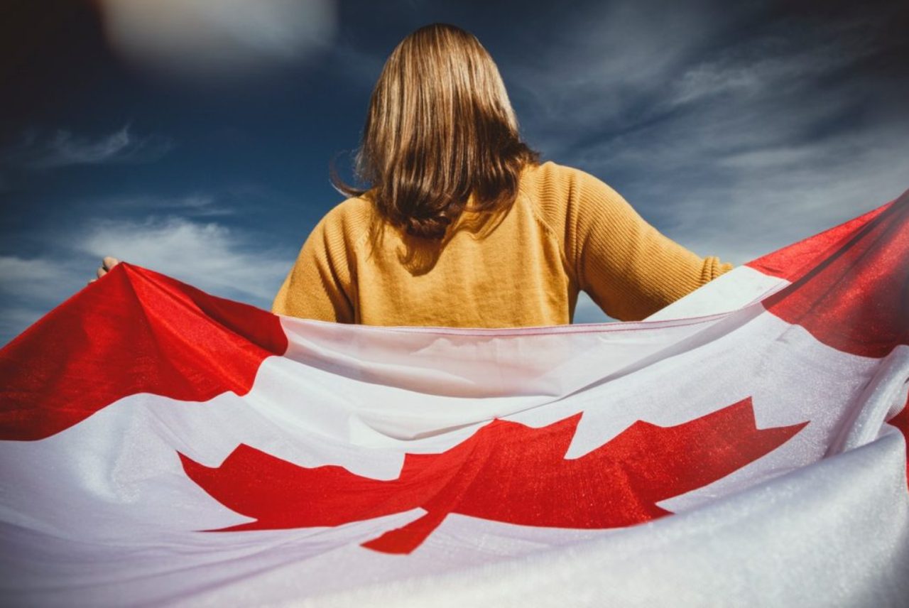 woman-holding-canada-flag-2960861