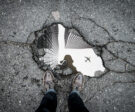 standing-over-pothole-marc-olivier-jodoin-502572-unsplash